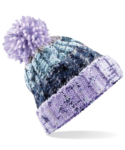 Gorro de lana con pompn y sacacorchos | Rosa Lavanda